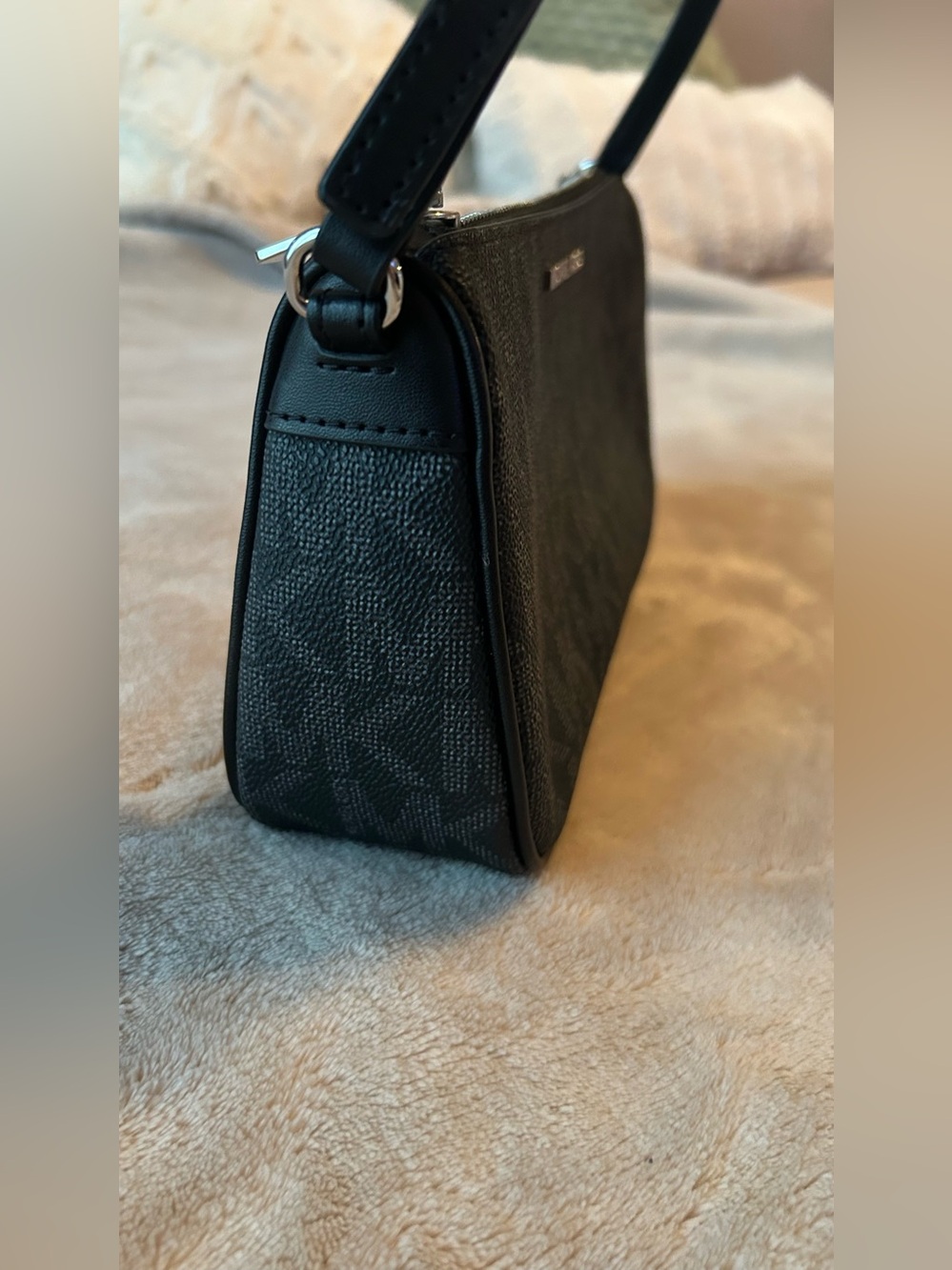 Michael Kors Jet Set Travel Medium Zip Pouchette, shown here in black signature